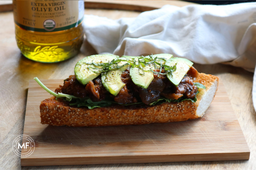 A crunchy toasted bread topped with heaps of Sicilian Caponata, finely cut avocado and a chiffonade of herbs. 
